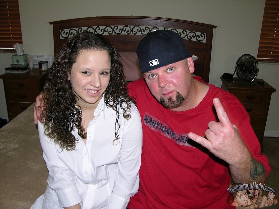 Sweet chick with curly hair and hot body gets down naked and sucks a bald stud's cock before she lets him fuck her in missionary style then cream on her hairy pussy on a brown bed. - XXXonXXX - Pic 1