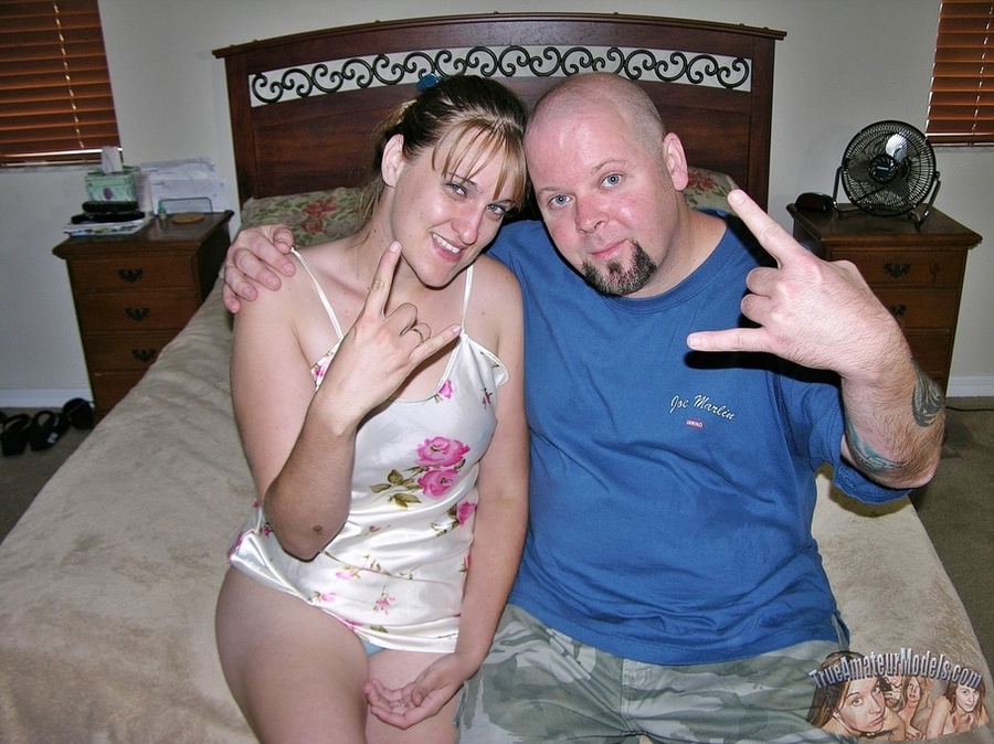 Luscious teen in alluring white floral nighty sucks a fat guy's dick then pulls down her blue panty and lets him bang her in doggy and missionary positions til he sprays his jizz on her belly on a gray bed. - XXXonXXX - Pic 1