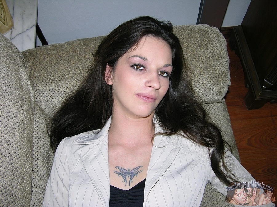 Pretty hottie reveals her stimulating twat under her white and black office dress in different positions on a gray couch then gets naked bares her sweet tits before she sucks a bald stud's cock while she lets him lick her pussy in sixty-nine positions then fucks her hard in missionary and doggy styles before he cums on her ass on a white bed. - XXXonXXX - Pic 2