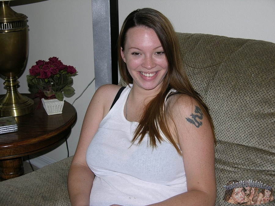 Hot chick takes off her white shirt and pants then displays her banging body in sexy underwear before she takes off her black bra and releases her big juggs then peels down her pink panty and expose her juicy pussy in different positions on a gray couch before she sucks a fat man's dick while she lets him lick her twat in sixty-nine position on a brown bed then bang her in doggy and missionary style. - XXXonXXX - Pic 2