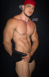 Large, musculous guy with red cap on shows a session of self pleasuring
