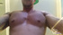 Large, musculous guy with red cap on shows a session of self pleasuring