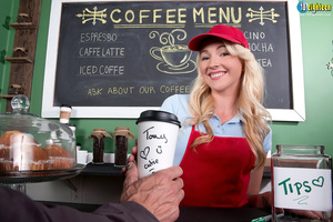 Blonde barista in a red hat and apron ge - Picture 3
