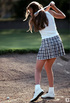 Teenage chick playing golf and showing her natural titties