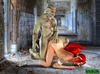 Inked ponytailed redhead blowing Frankenstein kneeling