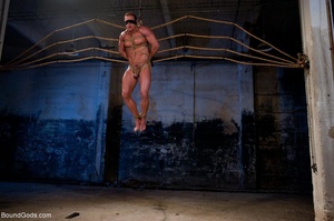 Two tied up hunks get used by their supe - Picture 1