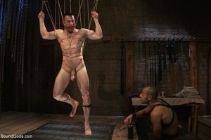 Bald man fucks a muscled tied up dude so - Picture 8
