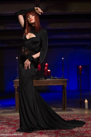 Elegant Mistress in a grand black dress  - Picture 2