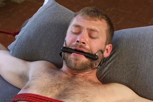 Bearded gay dude gets tied up and used b - Picture 17