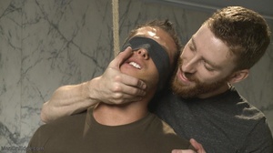 Muscled hunk in bondage and blindfold ge - Picture 4