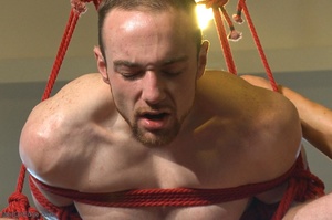 Tied up hunk sucks a huge dick and gets  - XXX Dessert - Picture 9
