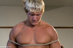 Muscled guy gets tied up and stimulated  - Picture 1
