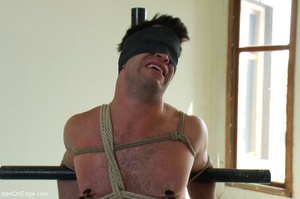 Good looking gay hunk gets tied up and d - Picture 6