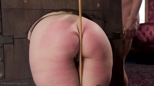 Dark-haired maid is caned, face fucked a - Picture 13