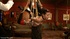 Suspension and lesbian licking help make the stern Master of two submissives