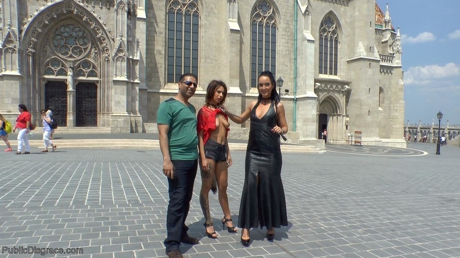 Tourists take photos of a slave who is made - XXX Dessert - Picture 7
