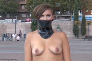Alluring gal exposes her tits in public  - Picture 9