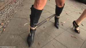 Slut waddles around in public with a leg - Picture 1