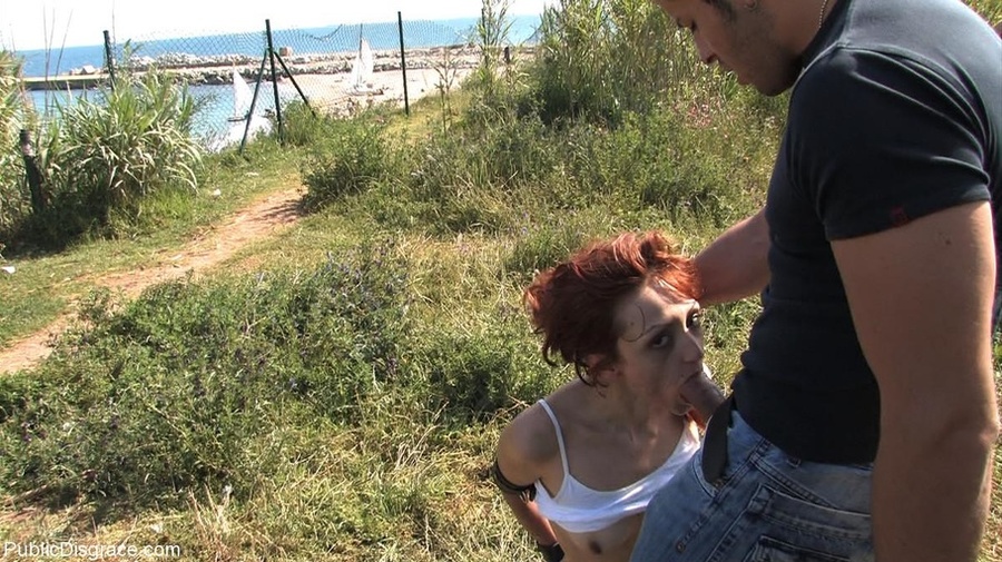 Redhead in a white tank top holds her panti - XXX Dessert - Picture 11