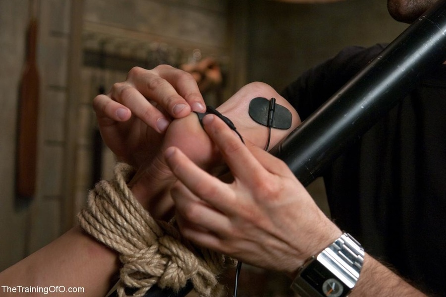 Stunning brunette is shackled to a wall whi - XXX Dessert - Picture 12