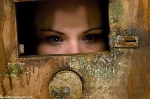 Minx with her head in a wooden box is la - Picture 9