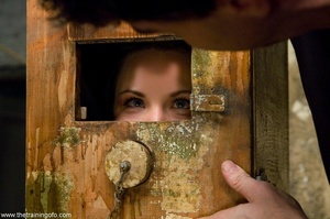 Minx with her head in a wooden box is la - Picture 10