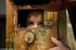 Minx with her head in a wooden box is later blindfolded and ordered to
