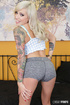 Inked blonde vixen with pink tits masturbates with a huge toy