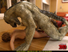 Dinosaur fucks a brunette lady in red shoes with pleasure
