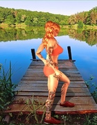 Redhead bitch gets rammed by a creature from the swamp