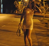 Brunette does sexy walk in public and reveals her perky tits and yummy