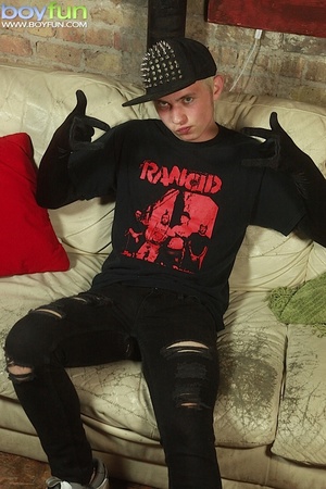 Hot blonde emo in assless shorts fingers his ass and rubs his thick cock - Picture 1