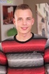 Preppy hunk Roy Garrett spreads his ass and shoots cum onto his ripped