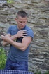 Super fit Michael strokes his thick cock and blows his load outside