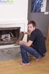 Nick Benedickt does sexy striptease and jerks his nice cock onto fireplace