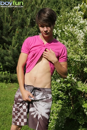 Cute guy wearing pink shirt has fun in the backyard and poses doggy style - XXXonXXX - Pic 3