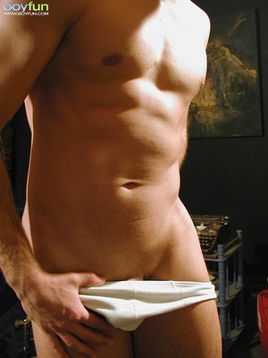 This gay looks so hot in his pants and white underwear and poses his great body for you - XXXonXXX - Pic 14