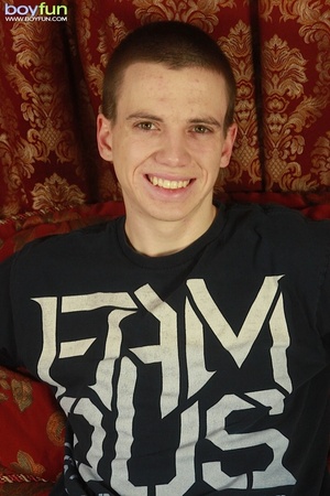 Twink with sexy chest tattoo has fun stroking his hard cock - XXXonXXX - Pic 1