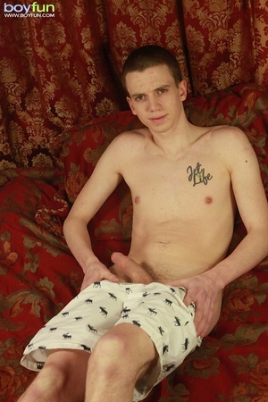 Twink with sexy chest tattoo has fun stroking his hard cock - XXXonXXX - Pic 10