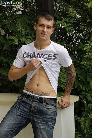 Hot tattooed lad undresses to show his black boxer and poses doggy style - Picture 2