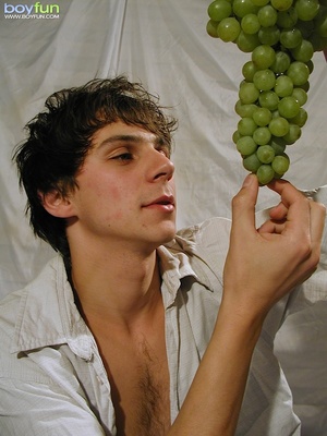 Hot and sexy dude rubs grapes in his balls and eats while he ravishes his penis - Picture 3