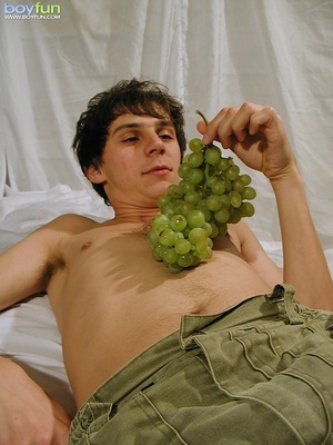 Hot and sexy dude rubs grapes in his balls and eats while he ravishes his penis - Picture 4