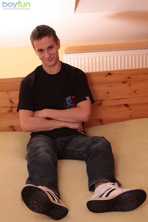 This handsome youth couldn’t resist stroking his dick in his bed - XXXonXXX - Pic 1