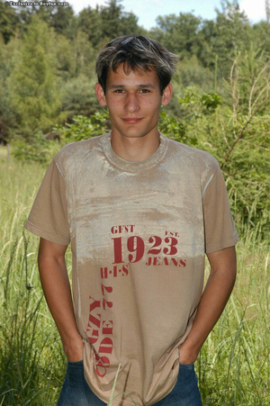 Hot farm boy goes naked in tall grass and teases us - XXXonXXX - Pic 1