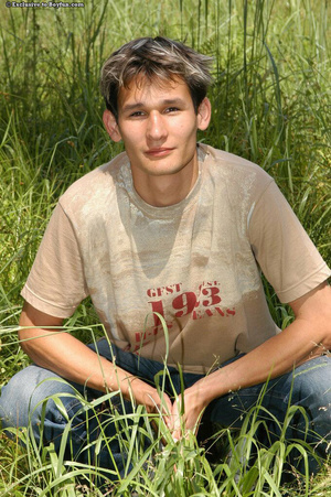 Hot farm boy goes naked in tall grass and teases us - Picture 2