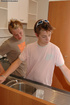 Young gay couple make out on the kitchen table and fuck
