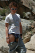 Amazing gay teen with glasses gets completely naked in public