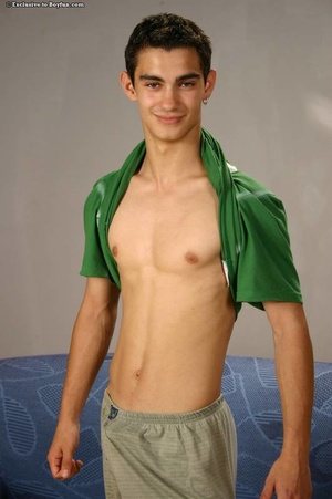 Hung man with green jacket shows off his steel hard abs - Picture 9