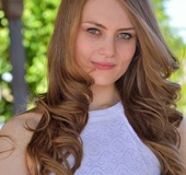 Curvy haired blonde goddess plays with her sex toys