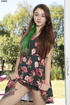 Cute chick peels off her black and pink floral dress and expose her skinny
